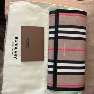 Burberry Icon E-canvas and leather continental wallet.